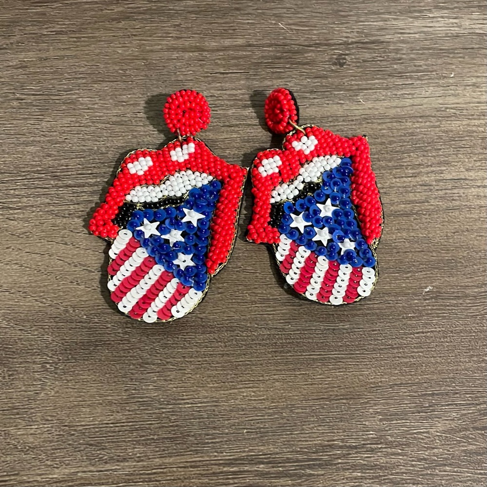 Never worn USA Rolling stone earrings